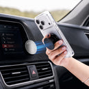 FAB POPS Anywhere Grip snapping onto the Anywhere Disc on a car dashboard
